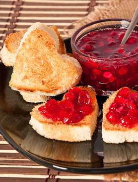 heart-shaped toast with jam 