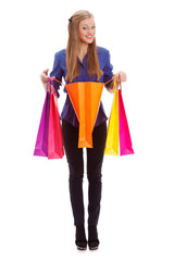 woman standing with opened shopping bag