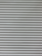 Obraz premium Fragment of window plastic blinds