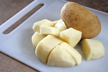 Potatoes on Cutting Board