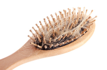 comb brush with lost hair, isolated on white
