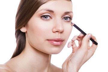 natural woman with eye pencil