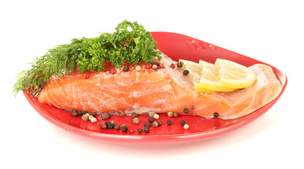 Fresh salmon fillet with herbals and lemon slices