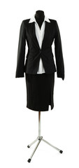 White blouse and black skirt with coat