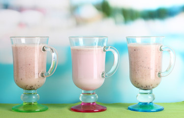 Cream cocktails on brightblue background