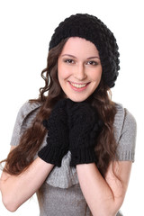 portrait of a beautiful happy woman in a knitted jacket