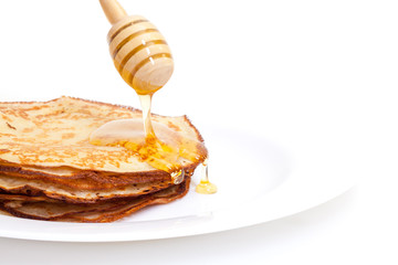 Delicious Freshly Prepared Pancakes with Honey