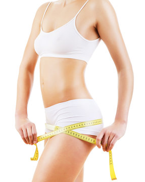 healthy attractive body with tapemeasure