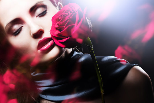 Attractive Woman With Red Rose