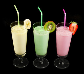 Banana, kiwi and strawberry milk shake and fresh fruis