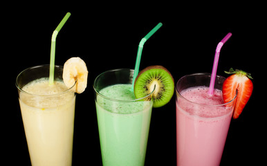 Banana, kiwi and strawberry milk shake and fresh fruis