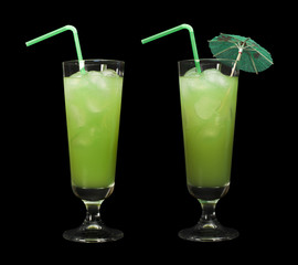 Green cocktail with cubes ice