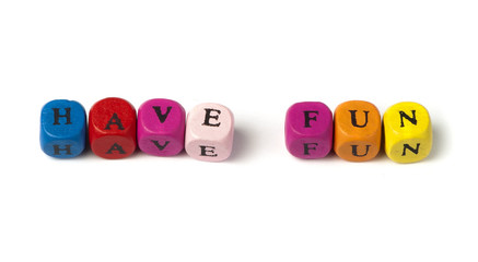 Words have fun on multicolored wooden cubes