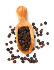 black pepper in a wooden scoop
