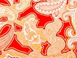 Red artistic batik fabric as background