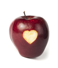 Plakat Heart shape closeup carved in apple