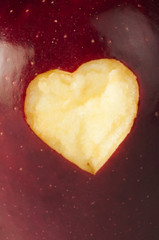 Heart shape closeup carved in apple