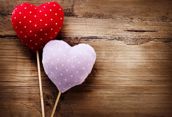 Valentines Vintage Handmade Hearts over Wooden Background