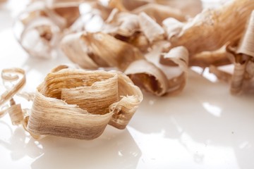 wood shavings over white background
