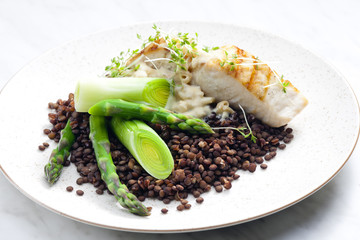 butterfish with green lentils, leek and green asparagus