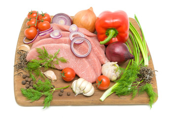 raw meat and fresh vegetables isolated on white background