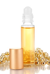 women's perfume in beautiful bottle and beads, isolated on