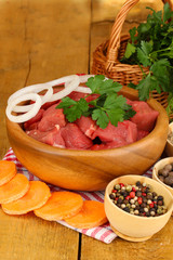 Raw beef meat with herbs and spices