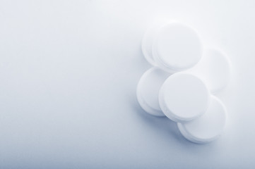 white tablet pills