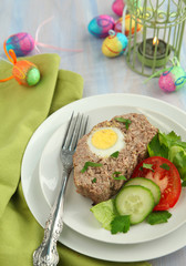 Sliced meatloaf with egg