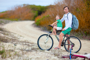 Father and daughter on a bike