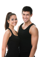 Fototapeta na wymiar Two sportive people in black sportswear embrace each other