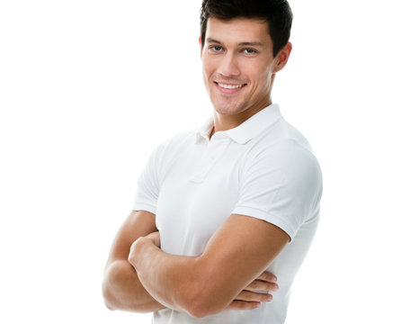 Portrait Of A Sportive Man With Arms Crossed In White T-shirt