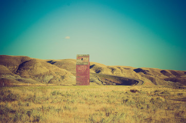 grain elevator on lonely road - Drumheller Alberta - LOMO