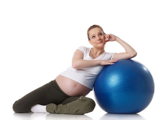 Fototapeta na wymiar Sport młoda kobieta w ciąży. Fitness.