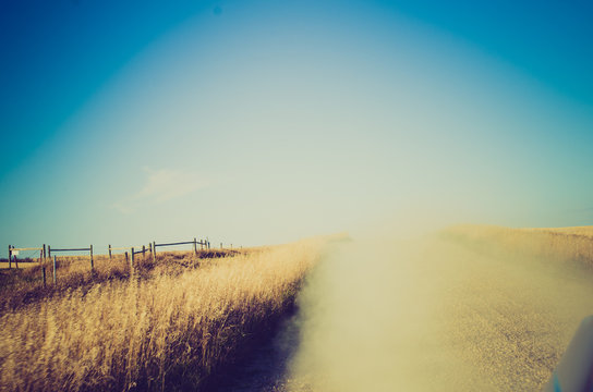 Dusty Gravel Country Road At Sunset - Drumheller Alberta - LOMO