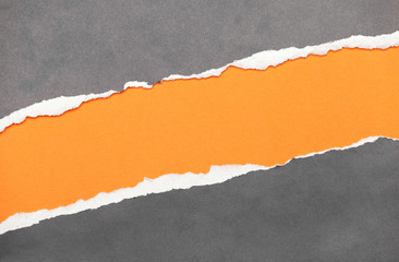 Torn edge paper with orange copyspace for your message