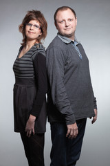 Happy couple in love. Man and woman. Studio shot.