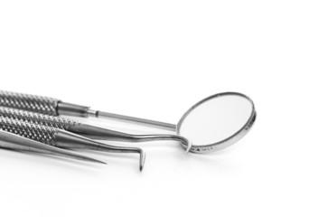 Basic dentist tools isolated on white