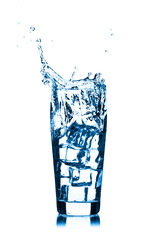 water splash in glass isolated on white background