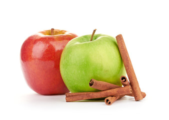 Red and green apples, cinnamon sticks - 48931670