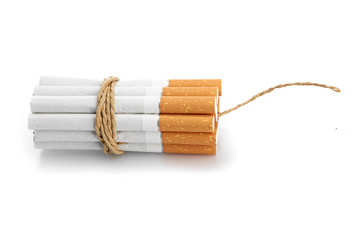 Cigarettes tied with rope and wick isolated on white