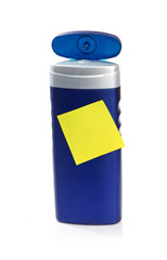 Blue cosmetic bottle isolated on white background