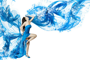 Woman dance in blue water dress dissolving in splash. Isolated w