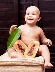 baby with papaya