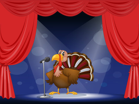 A turkey in the center of a stage