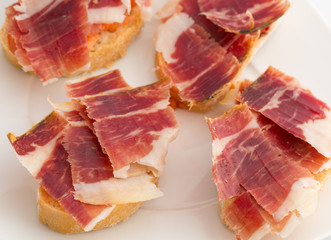 Spanish tapas, ham and tomato