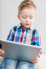Boy with tablet pc