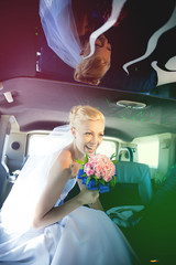 beautiful blonde bride in limousine