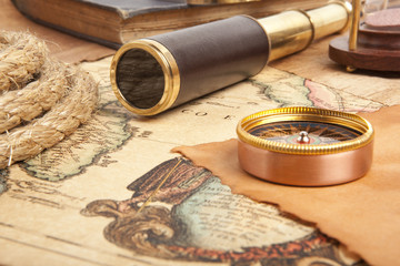 Brass telescope on map