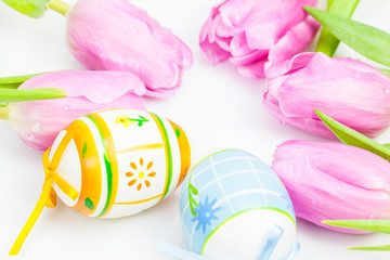 Frame made up of tulips and Easter eggs